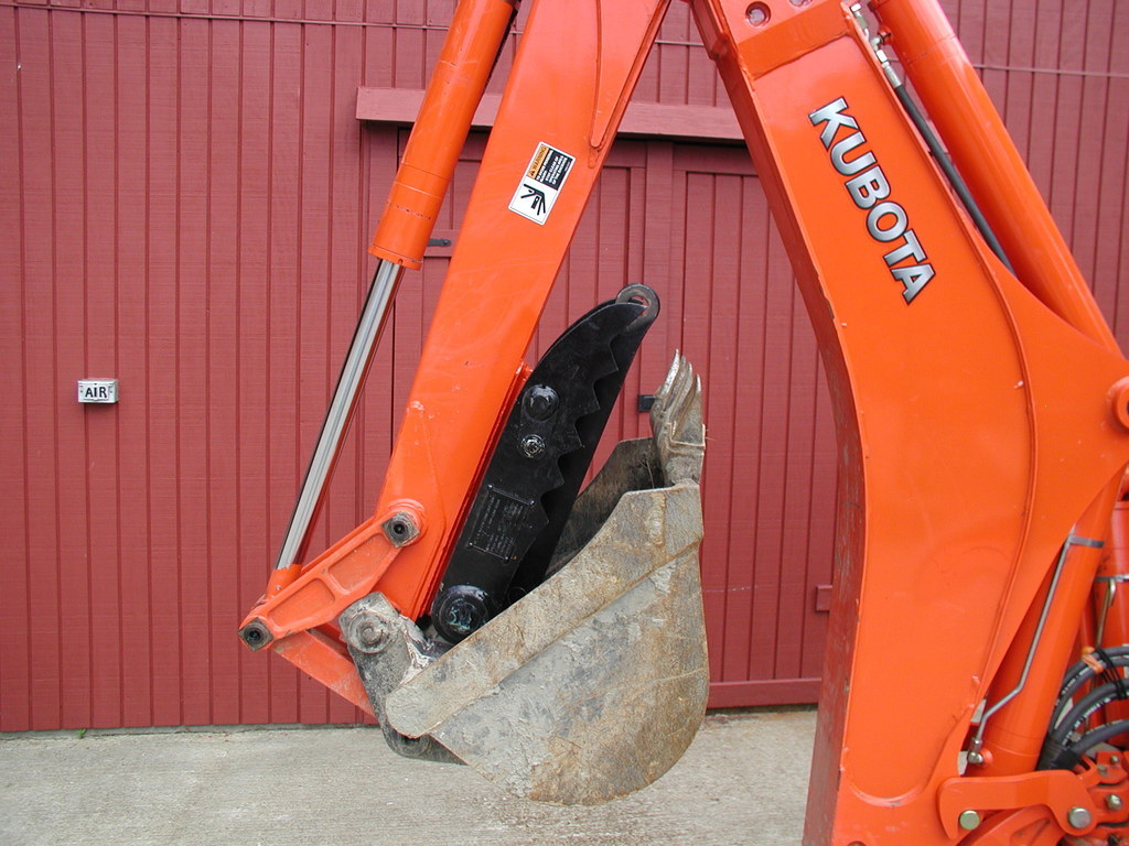 mini excavator with a bucket thumb